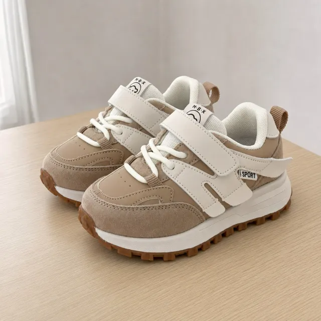 Toddler sneakers on a table, angle 1